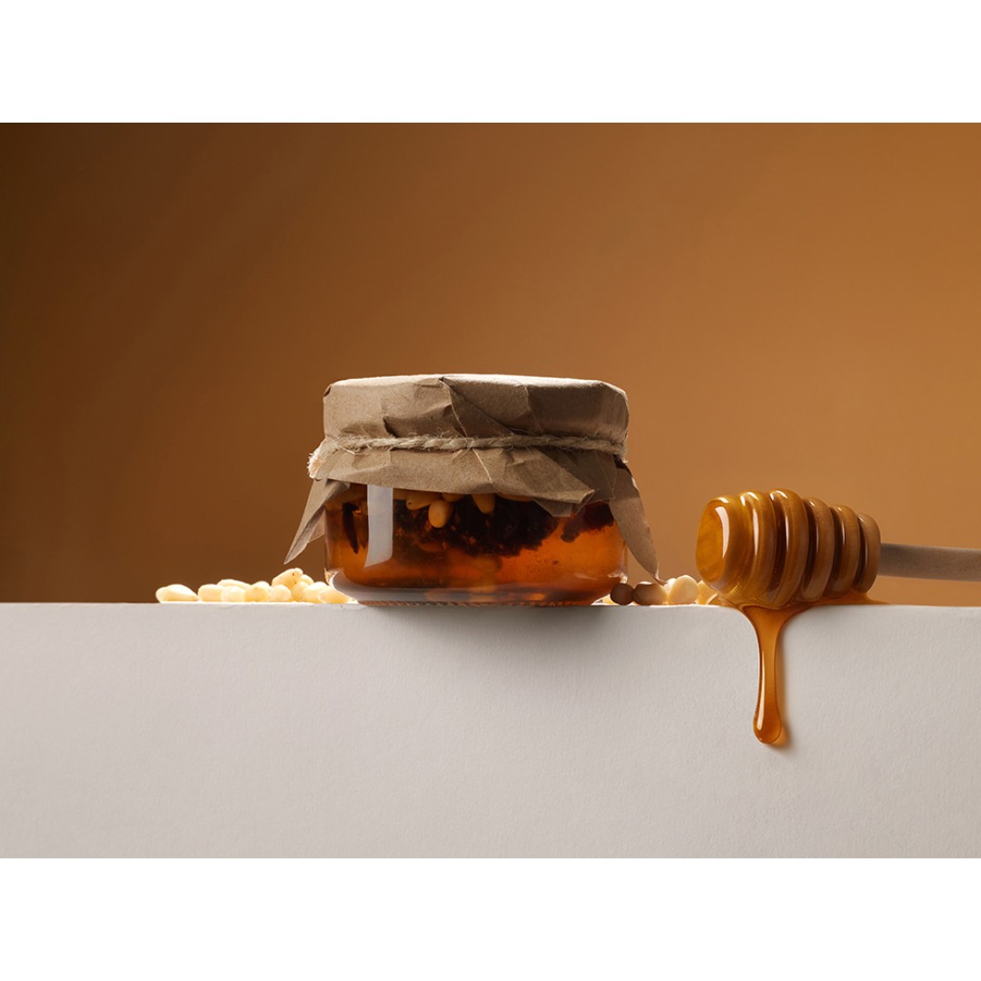 Мед с сосновой шишкой и кедровым орехом 120 гр.